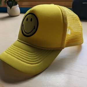 Yellow Smiley Face Trucker Hat
